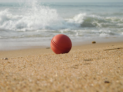 Cricket ball on beach